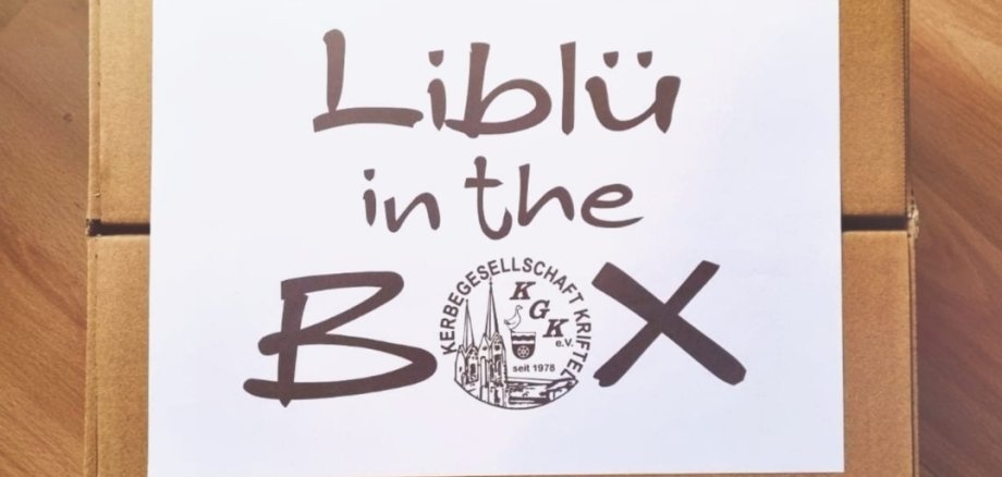 Ein Paket mit einen Aufkleber: Darauf steht "Liblü-in-the-box".