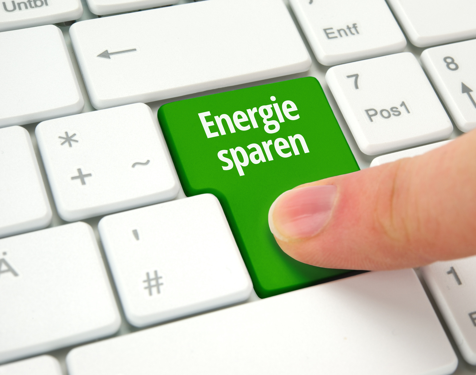Ein Button auf einer Tastatur mit der Aufschrift "Energie sparen".