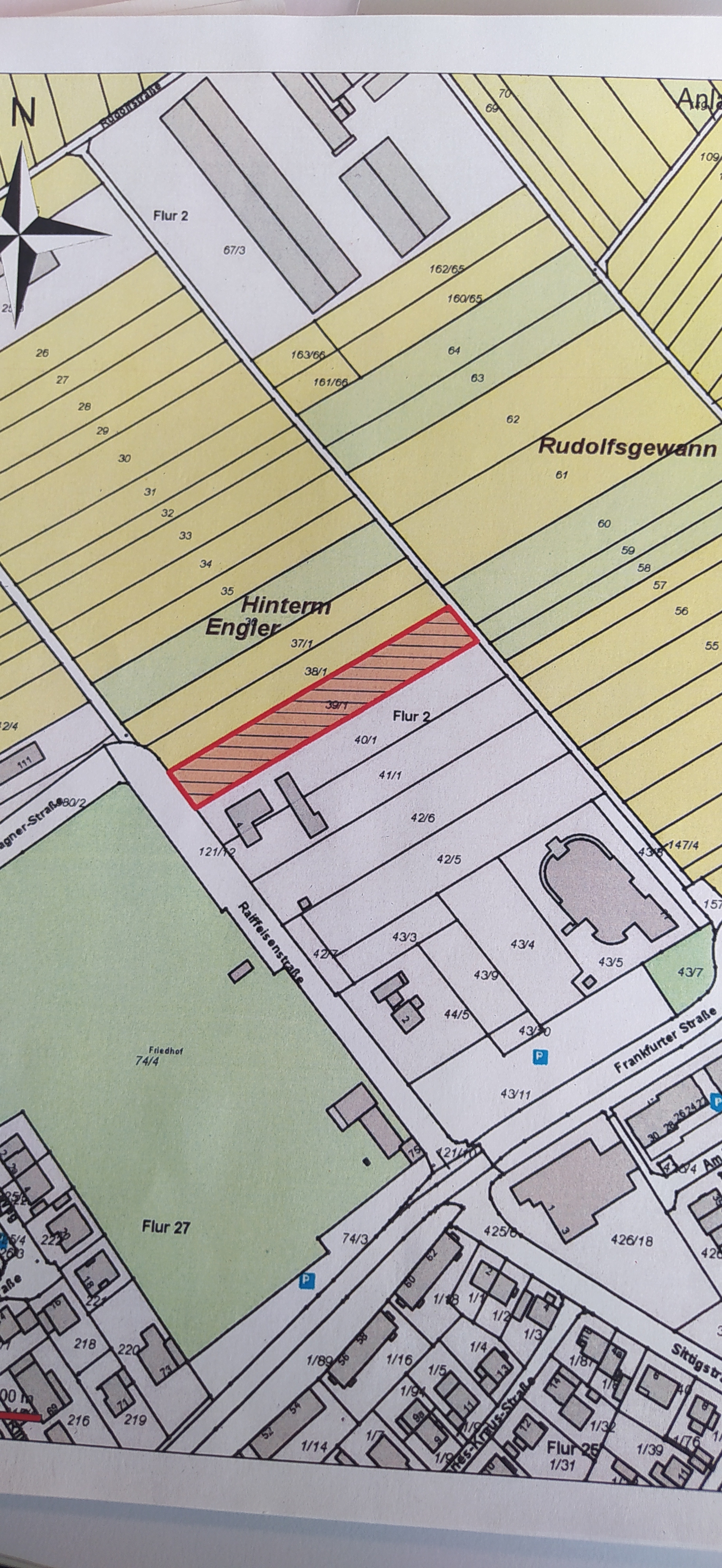 Ein Lageplan, wo man das Grundstück angemarkert sieht.