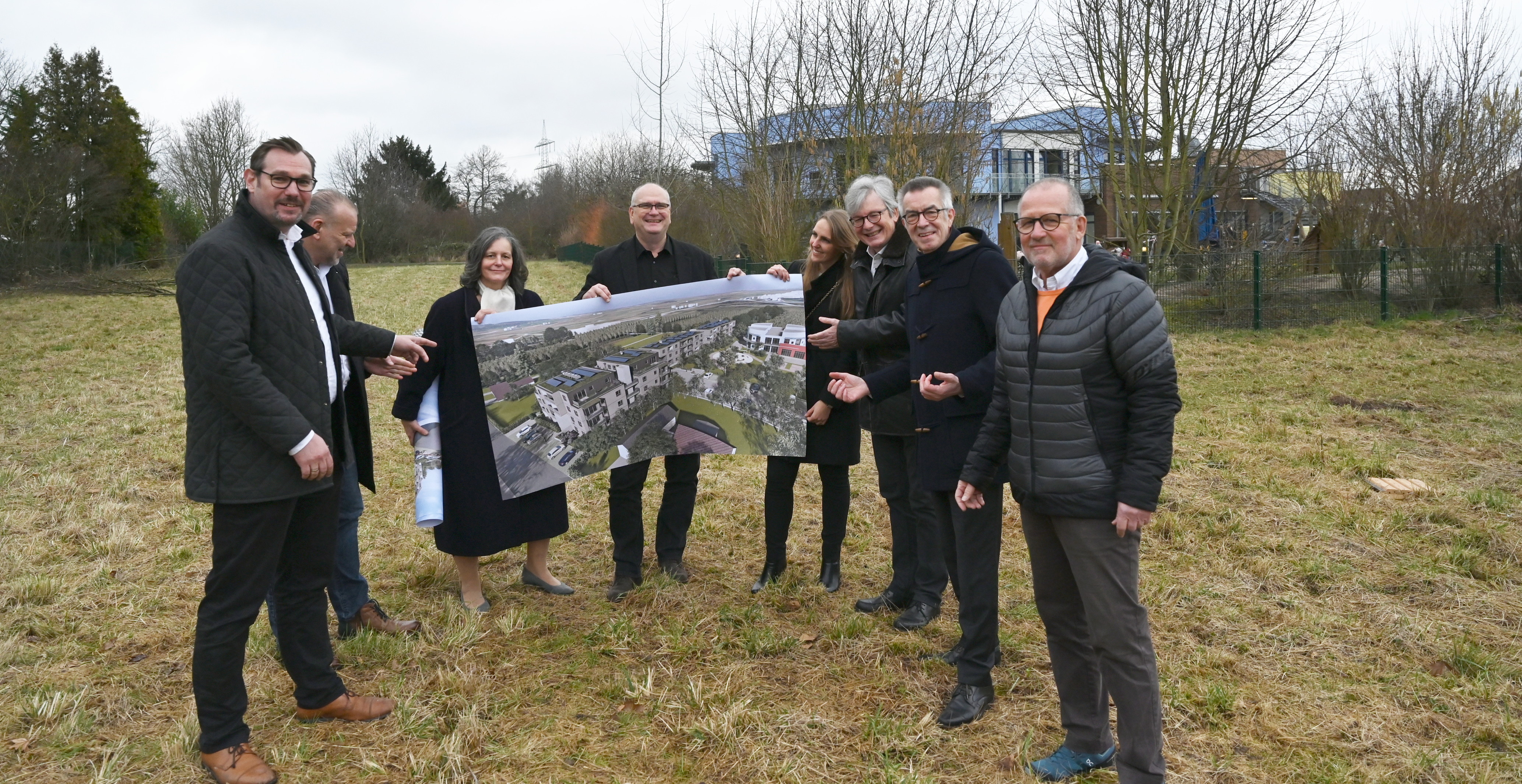 Verantwortliche von Gewobau, AH Aktiv Haus und Architekturbüro auf dem Grundstück Raiffeisenstraße.